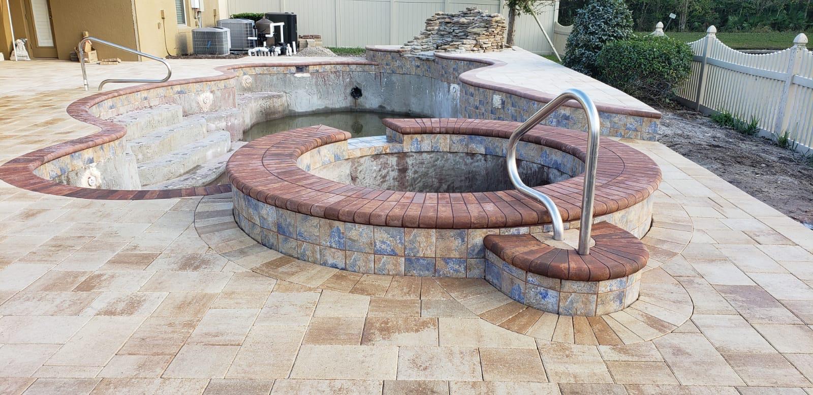 Custom paver pool and spa deck built by Borges Pavers